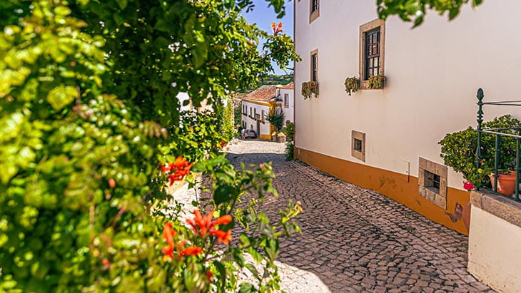 Traditional whitewashed buildings in the town of Óbidos, Portugal